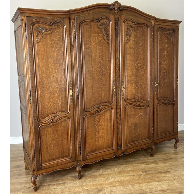This elegant Vintage French Louis wardrobe showcases classic French craftsmanship with beautifully shaped panelled doors,...