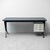 "ARCO" desk designed by BBPR for Olivetti. Featuring a simple metal frame and a suspended drawer unit. Blue leather top....