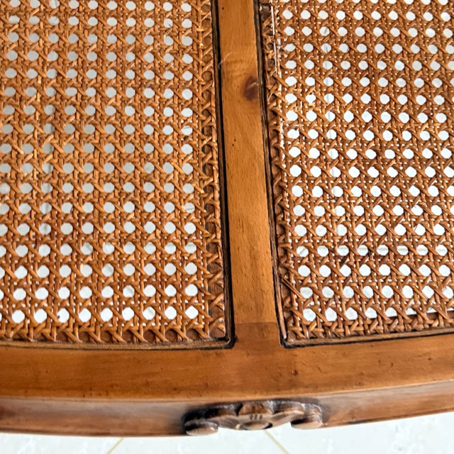 French Provincial Cane Bench A beautifully carved apron, turned and rolled arms, and cabriole legs…a great choice for a...