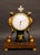 Refined small Biedermeier table clock, characterized by elegant proportions and representative of Central European...