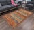 This stunning hand-knotted Afghan Balouchi rug is a captivating addition to any decor. Crafted by skilled artisans, it...