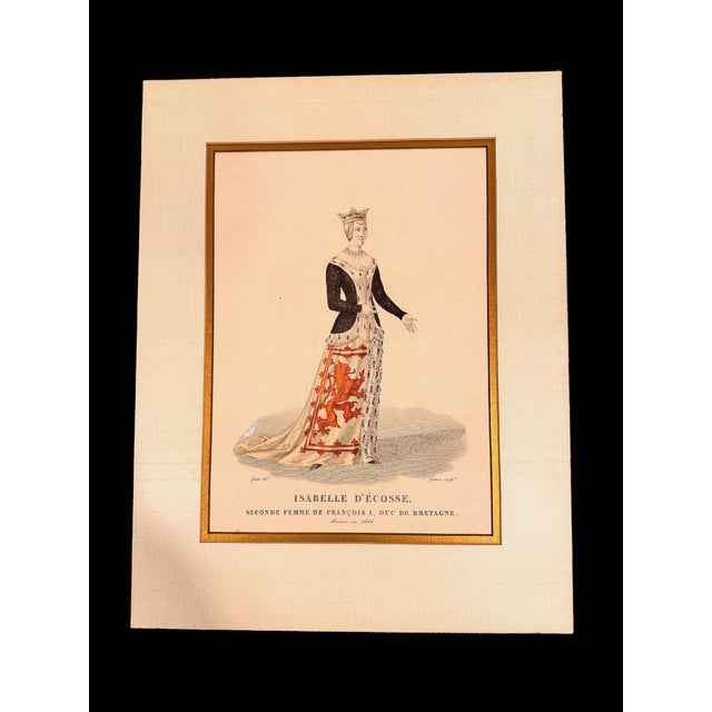 A matching set of two original 19th-century French hand-colored fashion engravings, professionally matted and framed. One...