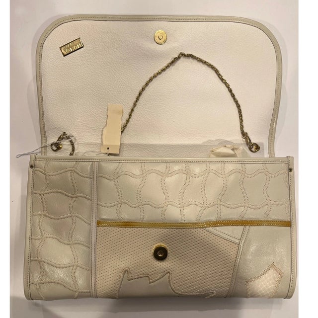 Stunning vintage "Bags by Varon" convertible shoulder bag and clutch. This beautiful 1970s/1980s piece features an...