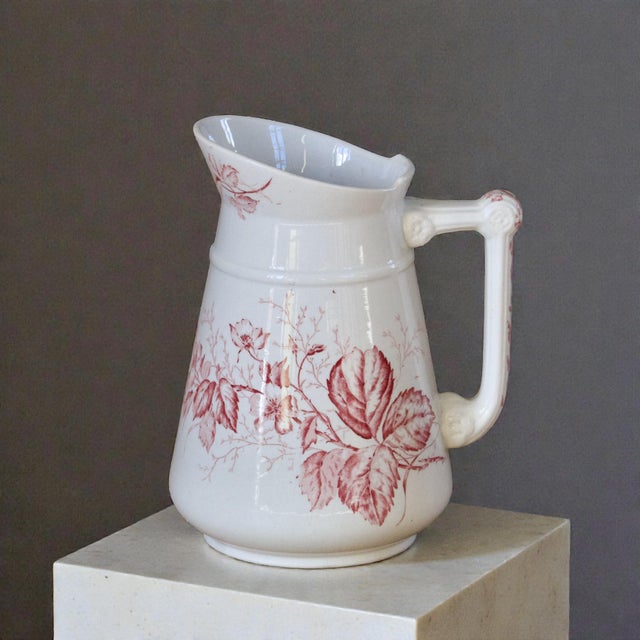 Large antique wash jug dating from the 19th century, pink ironstone, from the Imperial Bonn pottery factory (Germany)....