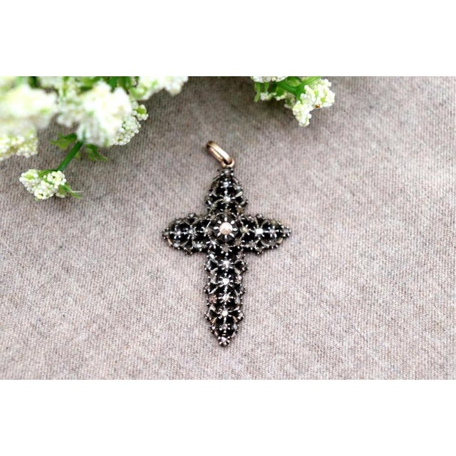 Gold Cross Pendant with Paw Print and Diamonds, in Worn conditions. Designed 1890 to 1919