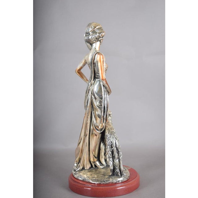 Art Deco revival figurines picked up again decades after the style's 1920s and 30s heyday, keeping its signature...