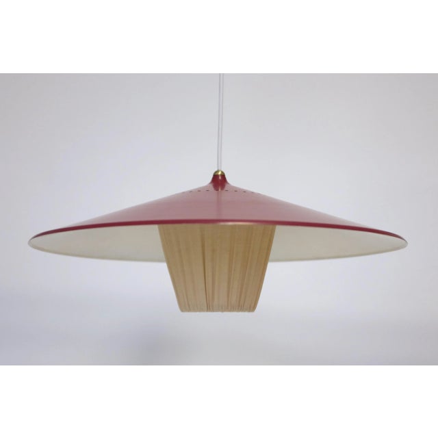 Vintage 1950s Swedish Ceiling Lamp possibly by Bergboms, Sweden. Beautiful red colored on the lamp shade with brass...