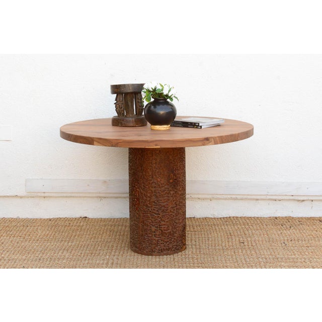 This 48-inch dining table is a testament to the enduring beauty of reclaimed Burma Teak. Sourced from historical...