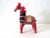 A vintage Indian Banjara horse, made of colorful linens and cottons, embroidery threads, ribbons, and yarn tassels, with...