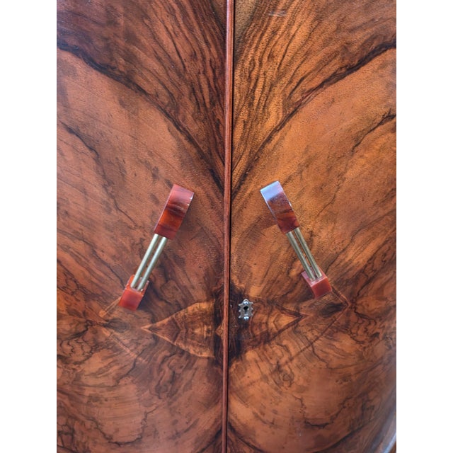 A Fantastic Burl Walnut Art deco Cocktail bar by Turnidge Company 1930s Light has been updated and dry bar is ready for...