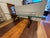 Early 21st Century Contemporary Sculptural Trestle Wood + Glass Dining Table For Sale - Image 5 of 12