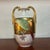 Stunning antique Parisian vase. Gold accents with parrot design.