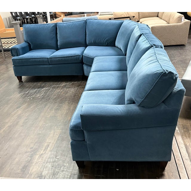 Design Plus Gallery presents a Three-Piece Sectional from Bassett Furniture. The teal blue upholstery has a velvety...