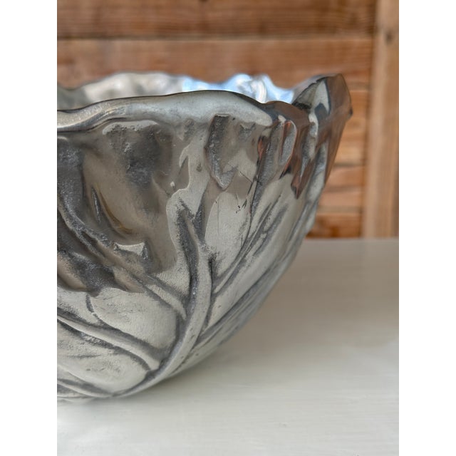 A sculptural vintage cabbage-form decorative bowl, crafted in cast metal with a pewter-tone finish. The deeply modeled...