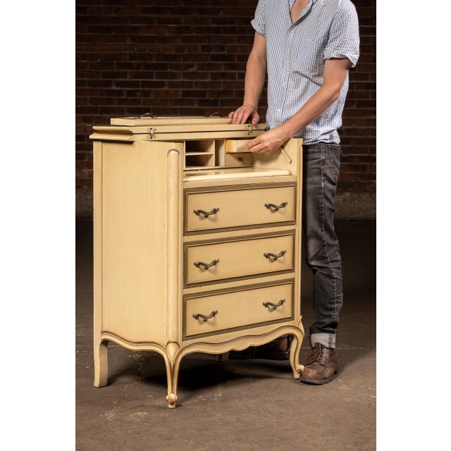 c. 1960s; Drexel Furniture Co. - Drexel, NC From Drexel's Touraine Collection, this French Provincial-inspired gentleman's...