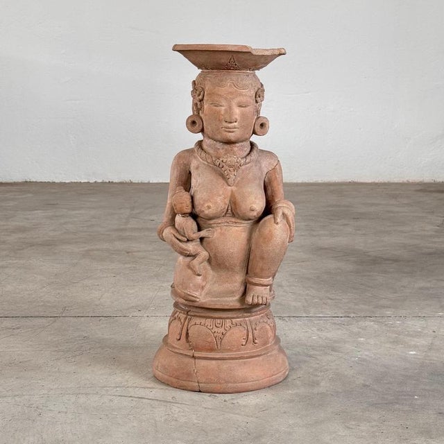 Immerse yourself in the captivating legacy of the Majapahit Empire with this rare and beautifully preserved 15th-century...