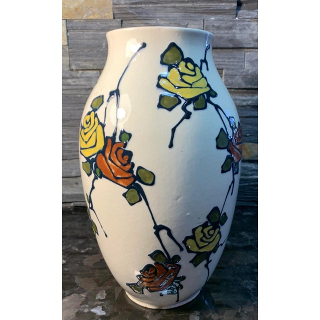 This beautiful white porcelain vase was made circa WWI by the Royal Dux company in present day Czech Republic. The bottom...