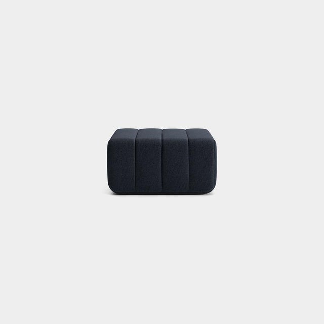 Pouf, stool, ottoman—or simply the building block for what is probably the world’s most versatile sofa system? The Curt...