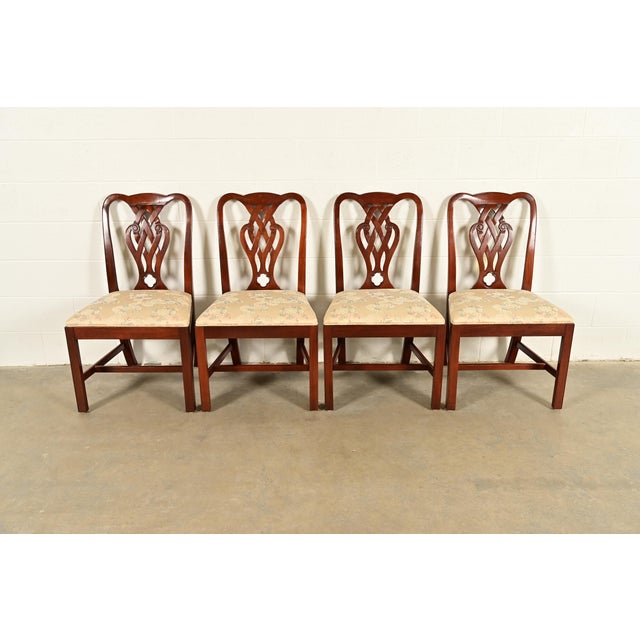 A gorgeous set of four Georgian or Chippendale style dining chairs By Baker, Knapp & Tubbs (The historic showroom division...