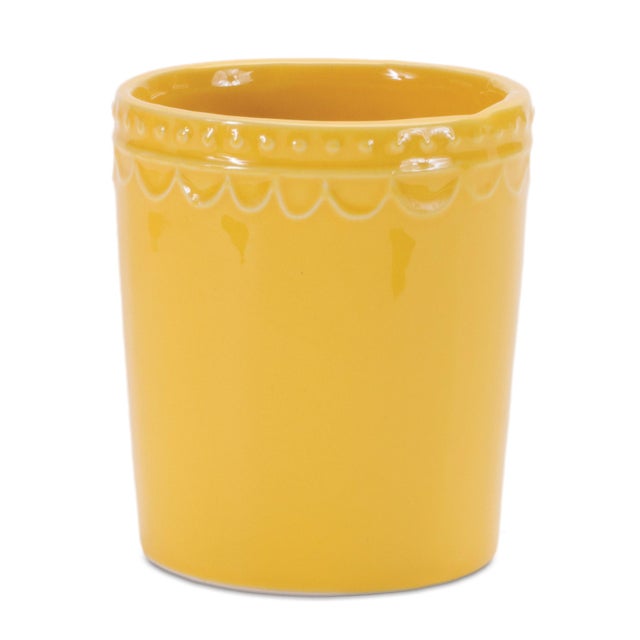 Brighten up your space with the Stoneware Bud Vase Set. Featuring vibrant yellow and pink tones with a shiny glazed...