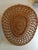 Beautiful woven wicker mirror with a triangular plectrum shape. The shape is unique because I've seen very few like it....