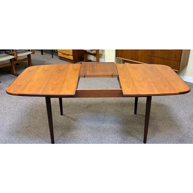 G-Plan Furniture European Mid Century Modern Extending Teak Dining Table W/ Butterfly Leaf by G-Plan c.1960 For Sale - Image 4 of 10