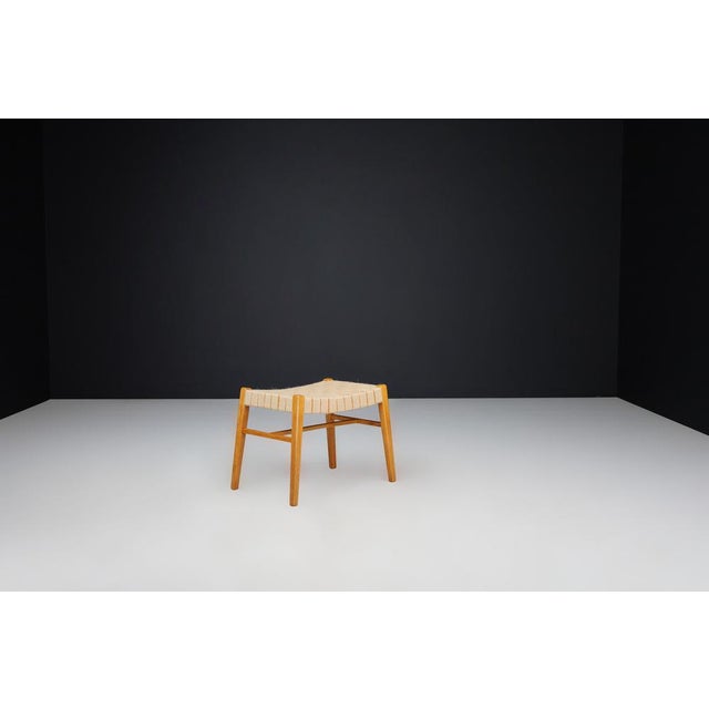 A rare and beautifully crafted oak and canvas stool designed by Czech architect and designer Jan Vaněk in the 1940s. This...