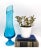 Gorgeous swung vase from the mid-20th century. Features a vibrant teal blue and an elegant design. Perfect for any mid-...