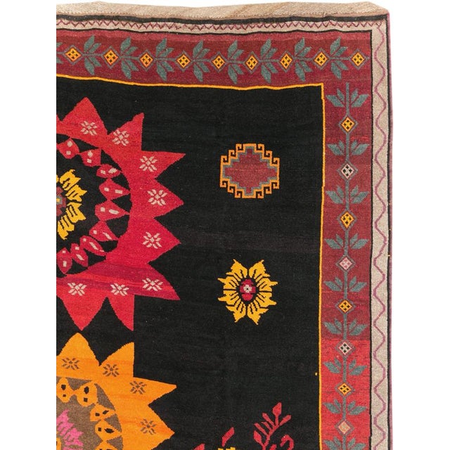 A vintage Turkish Anatolian large tribal room size carpet handmade during the Mid-20th century. Measures: 11' 8" x 16' 3"