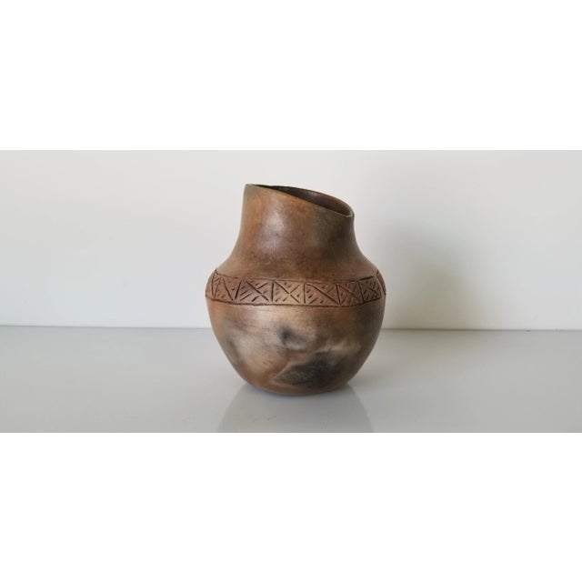 For your consideration we are presenting for sale this fantastic Vintage Native American studio pottery Vase. Features,...