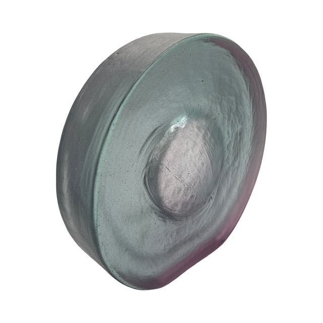 A substantial hand-blown studio art glass sculpture featuring a striking organic portal form in softly blended shades of...