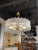 Exquisite shaped drum shaped modern Murano glass and brass chandelier. Beautiful textured glass on a decorative base. So...
