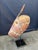 Striking vintage African hand-carved wood mask featuring an elongated face, tall antelope-form horns, slit eyes and deeply...