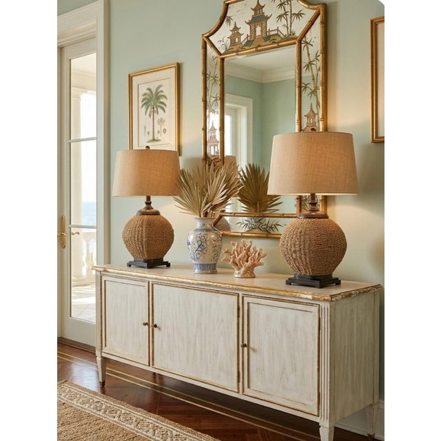 wonderful pair of rounded jute covered table lamps with brown base and neck. The lamps are a wonderful simplistic design...