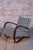 Model: h-269 conceived in the spirit of interwar art deco, this exceptionally iconic and dynamically shaped armchair...