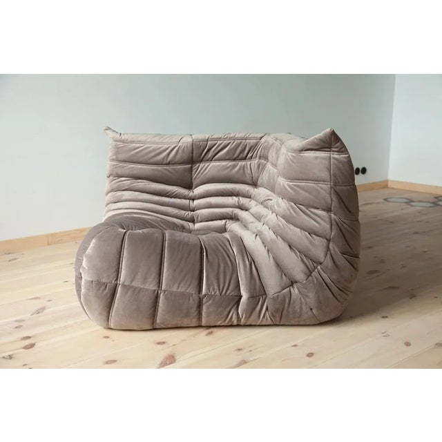 This Togo has been reupholstered with new foam and high-quality new fabric, keeping its inner structure giving the item...