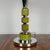 An Art Deco Dome Lamp. Sections of fluted green bakelite with chromed metal banding and domed shade. Green bakelite finial...
