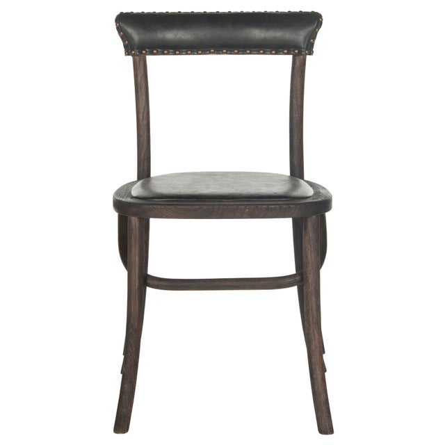 Straddling country, retro and industrial chic styles, the side chair is reminiscent of Thonet bentwood seating. Crafted of...