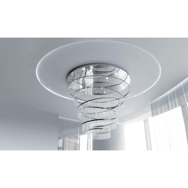 Saturn crystal pendant lamp by aggiolight dimensions: d 110 x h 100 cm. Materials: polished chrome metal, crystal. all our...