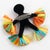 Textile Black Lucite Carved Samba Dancer Figurine Brooch with Colorful Raffia For Sale - Image 7 of 9