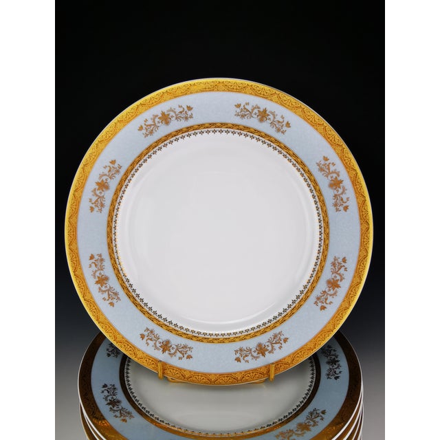 A rare and superb set of six Limoges porcelain dinner plates by Philippe Deshoulières in the "Orsay" pattern (sky gray)....