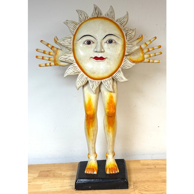 Sergio Bustamante Monumental Carved Sun Sculpture, Mexico, Circa 1980s A large and compelling hand-carved and hand-painted...