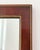 Large vintage Federal-style rectangular mirror with a warm mahogany-finish frame and parcel-gilt trim. Features a classic...