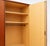 Vintage mid-century four-door wardrobe from the 1960s. This spacious vintage wardrobe features a clean, understated design...