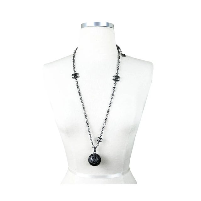 Chanel Gunmetal CC Black Crystal Ball Pendant Necklace *Marked 07 *Made in Italy -The length is approximately 34" long....