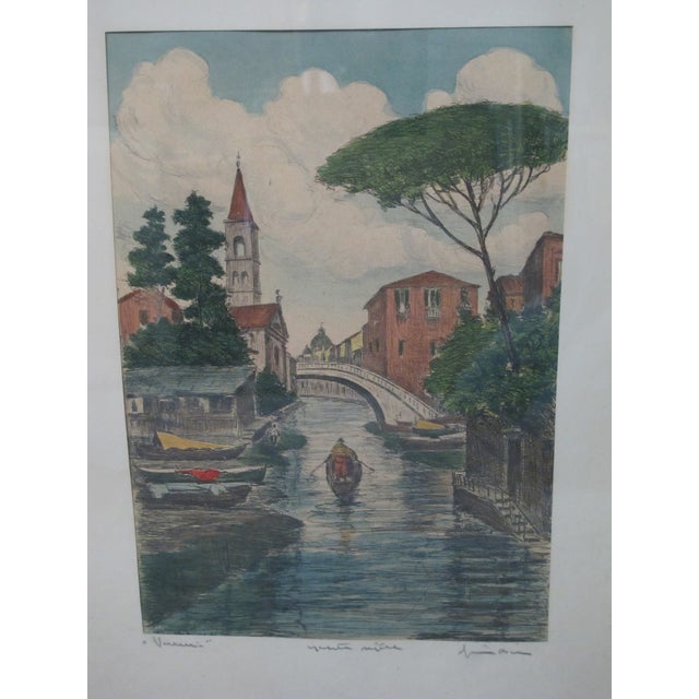 Bela Sziklay (Hungarian, 1911 - 1981) 1930's hand colored etching of canals in Venice showing a gondola amongst colorful...