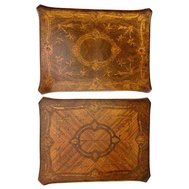 A rare and elegant pair of French marquetry writing tables dating to circa 1860, each crafted with its own distinct...
