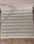 EA 117 Aluminium Desk Chair in White Leather and Chrome by Charles and Ray Eames for Vitra For Sale - Image 6 of 12
