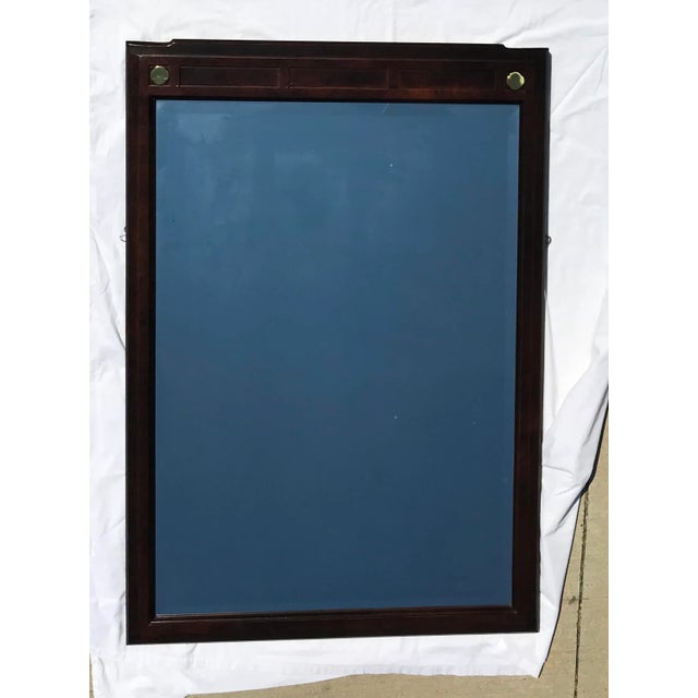 Vintage 1960s heavy walnut campaign style mirror with brass detail at top corners; excellent condition. Matches White...