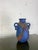 Sculptural studio art pottery vase featuring a dramatic amphora form with four loop handles and richly textured crossed...
